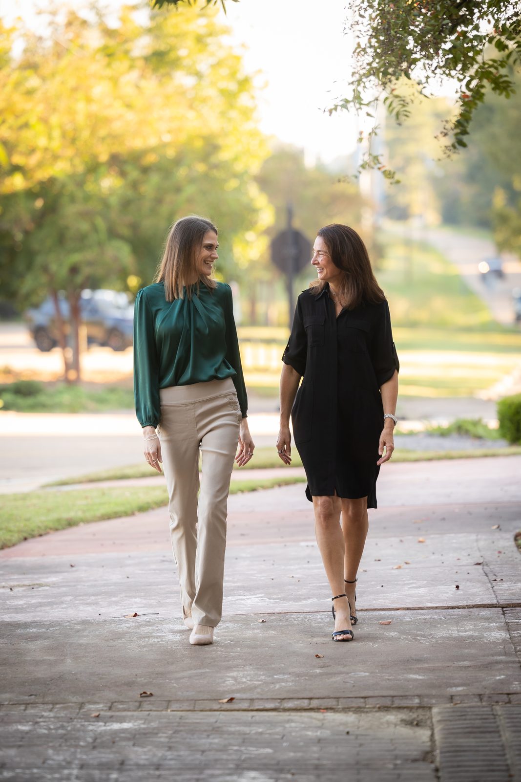 Kelly and Amanda walking together — EWL walks alongside patients for the long haul